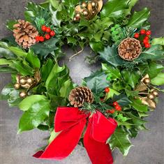 Holly Wreath With Pine Cones and Bow